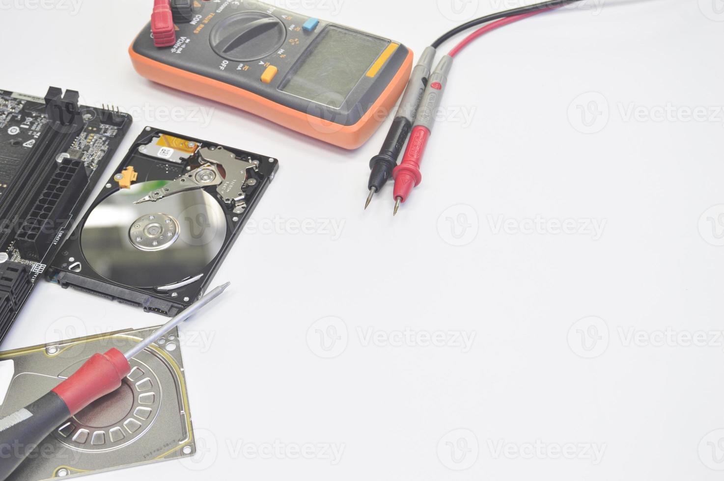 top view technician repairing hard disk photo