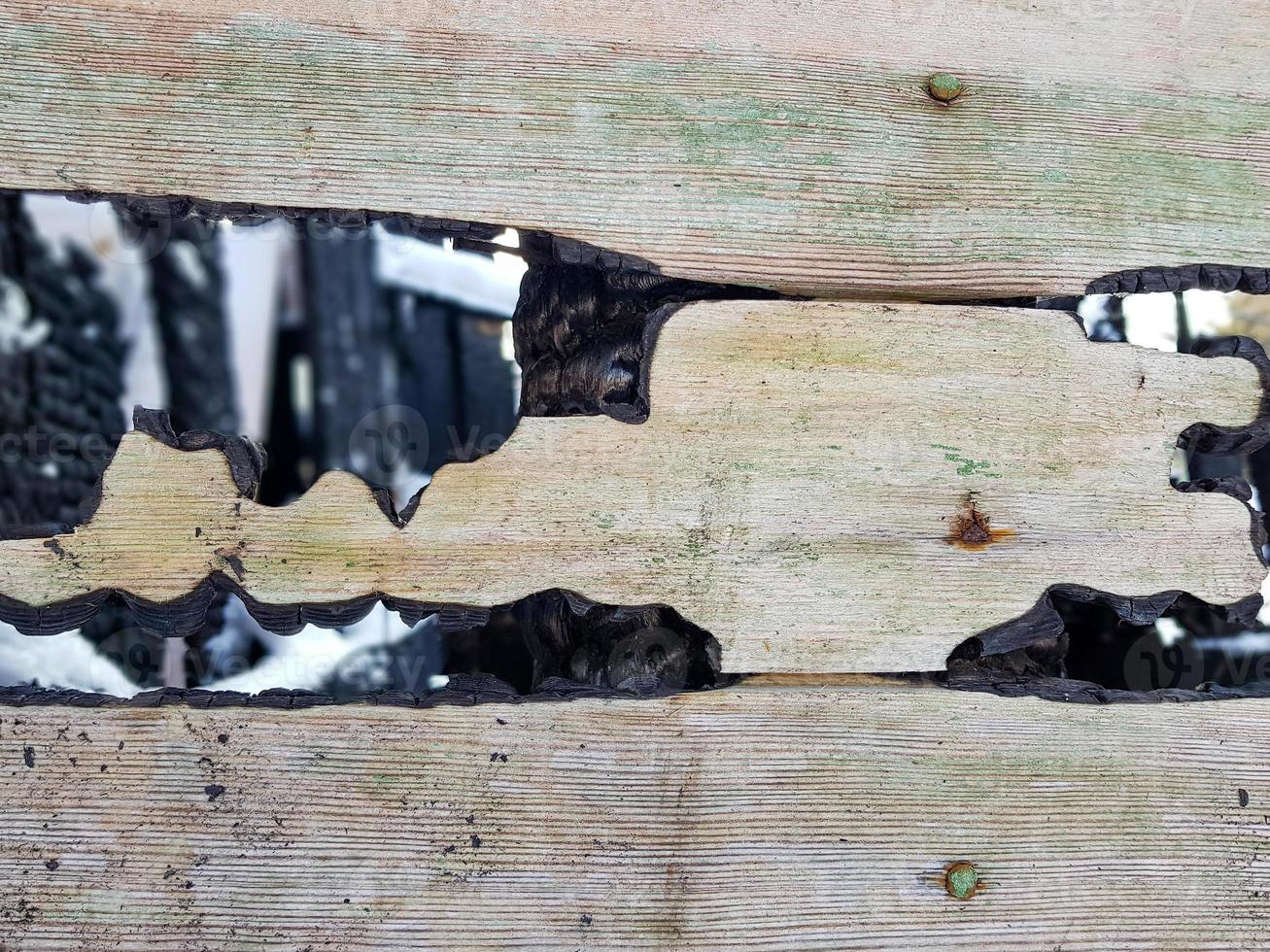 Burnt wood Board texture. Boards in the background after the fire. photo