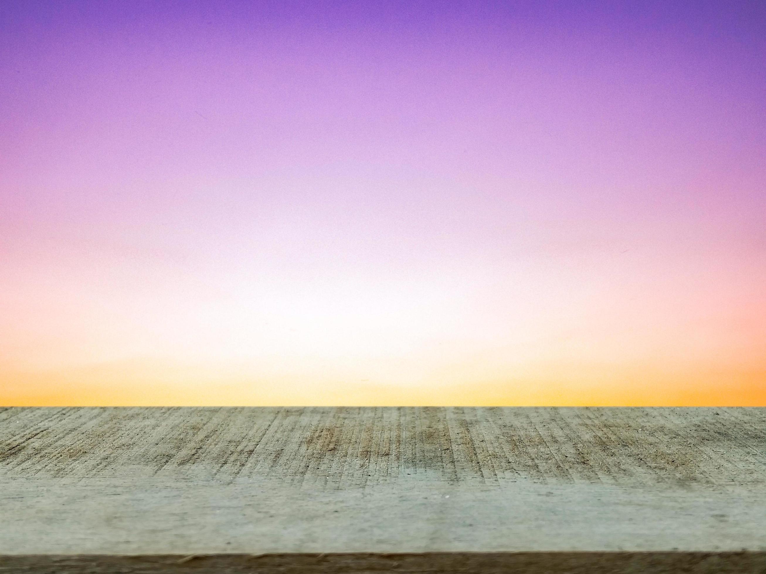 empty brown wooden table orange purple gradient background design