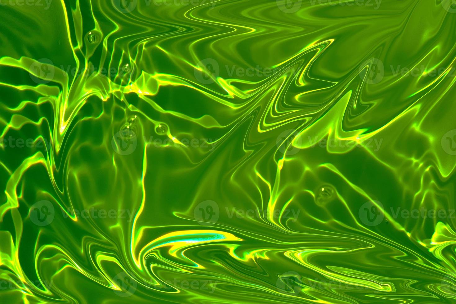 Defocus blurred transparent green colored clear calm water surface texture with splash, bubble. Shining green water ripple background. Surface of water in swimming pool. Tropical green water textures photo