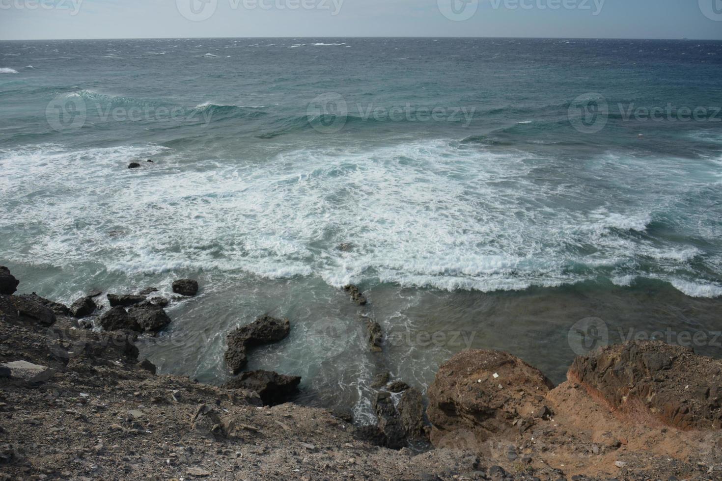 Vulcanic geologic coroded layers, Faro de Punta Jandia, Fuerteventura, Canary Islands, Spain. photo