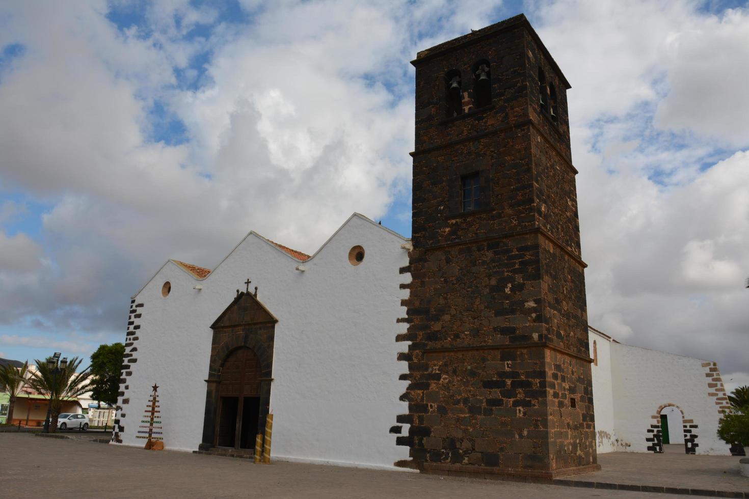 Typical Canary style white church building in La Oliva village, Fuerteventura, Canary Islands, Spain photo