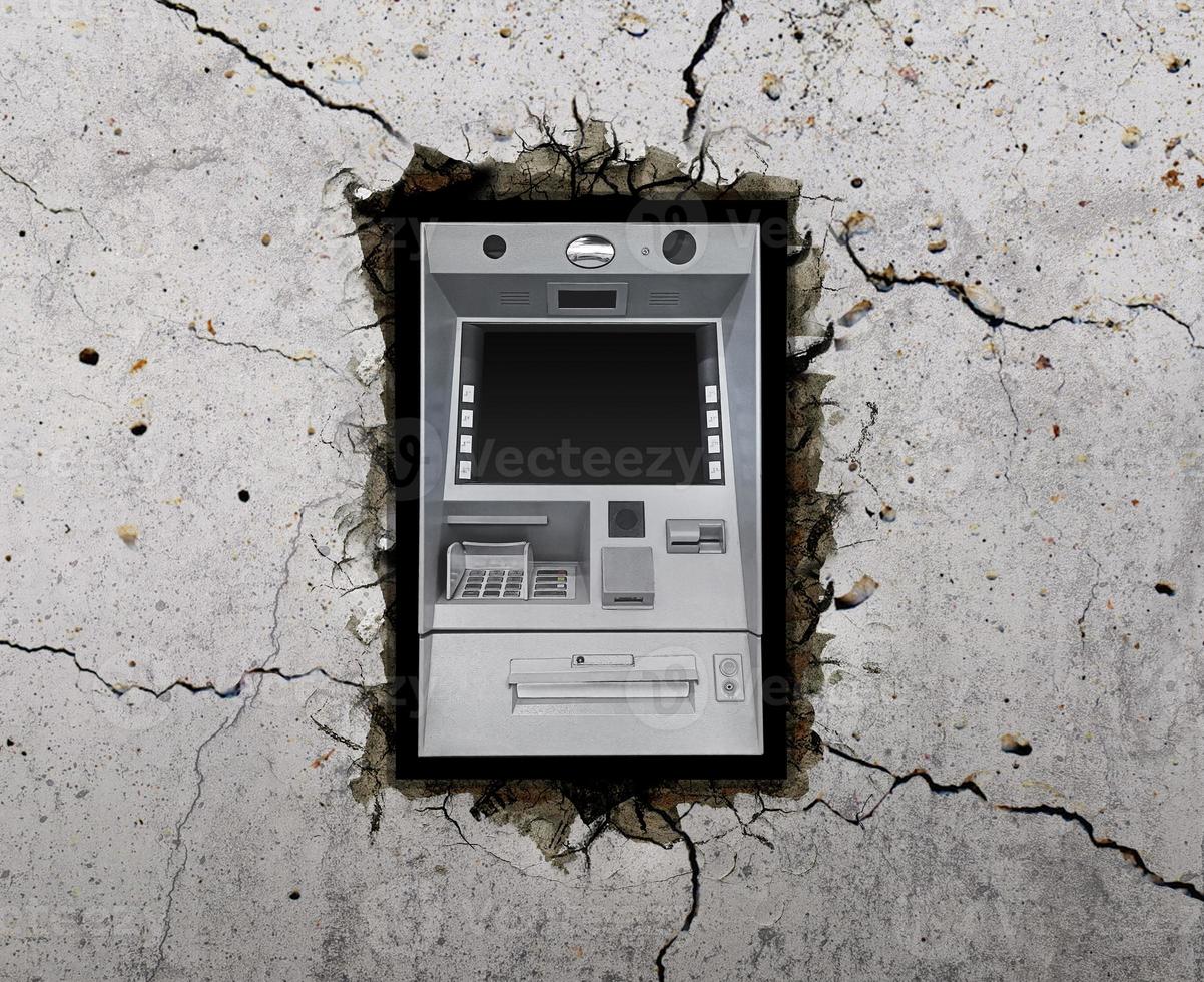 Atm Machine on through the wall with cracks photo
