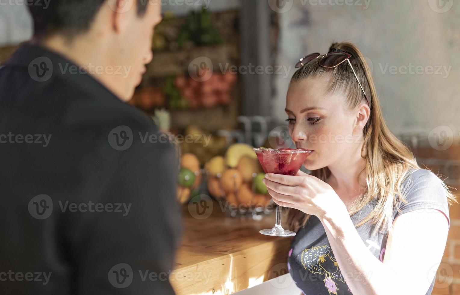 love couple sitting in the coffee bar enjoying beautiful fall day photo