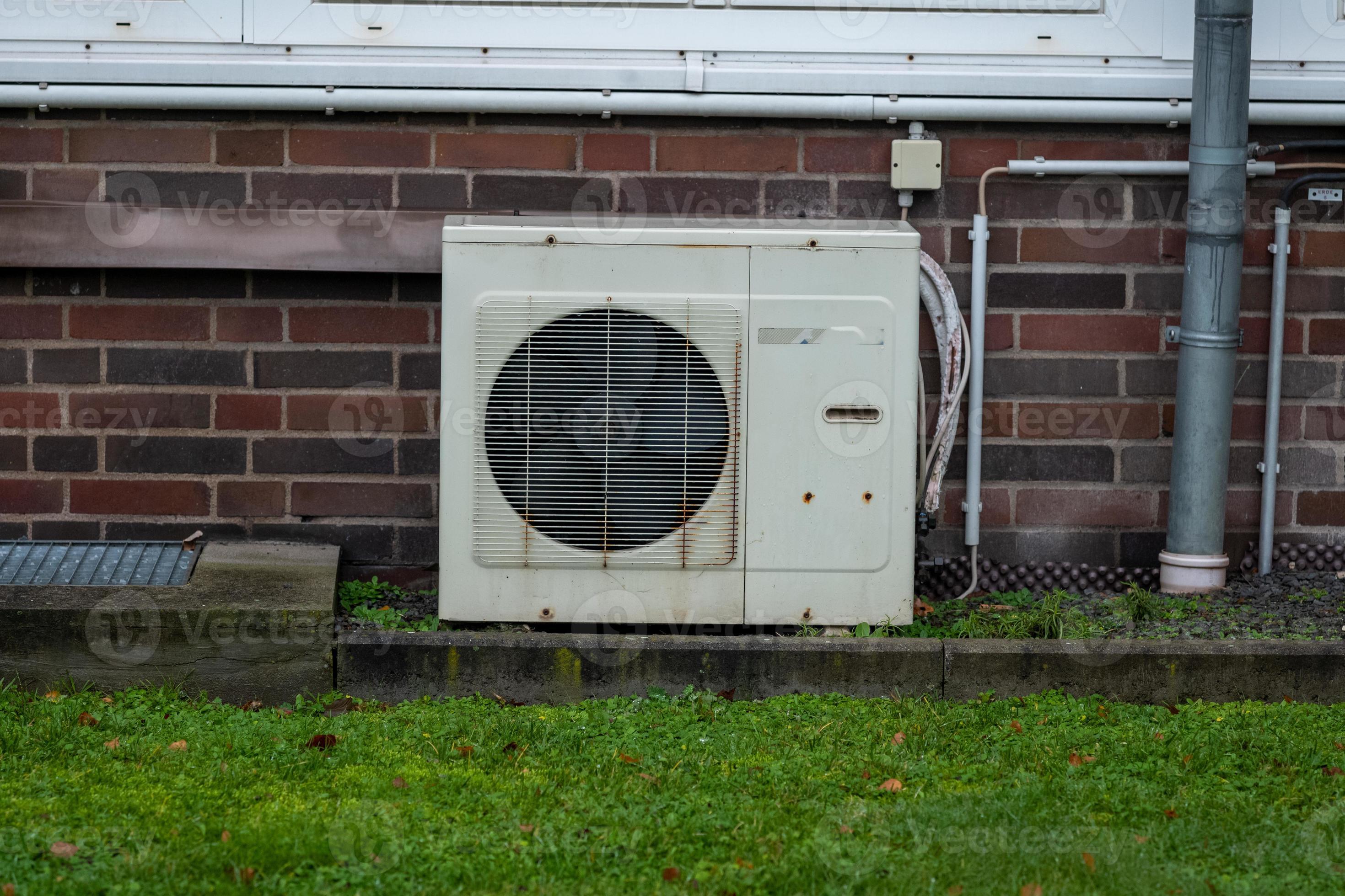 old rusty air conditioner on a brick wall 16646315 Stock Photo at Vecteezy