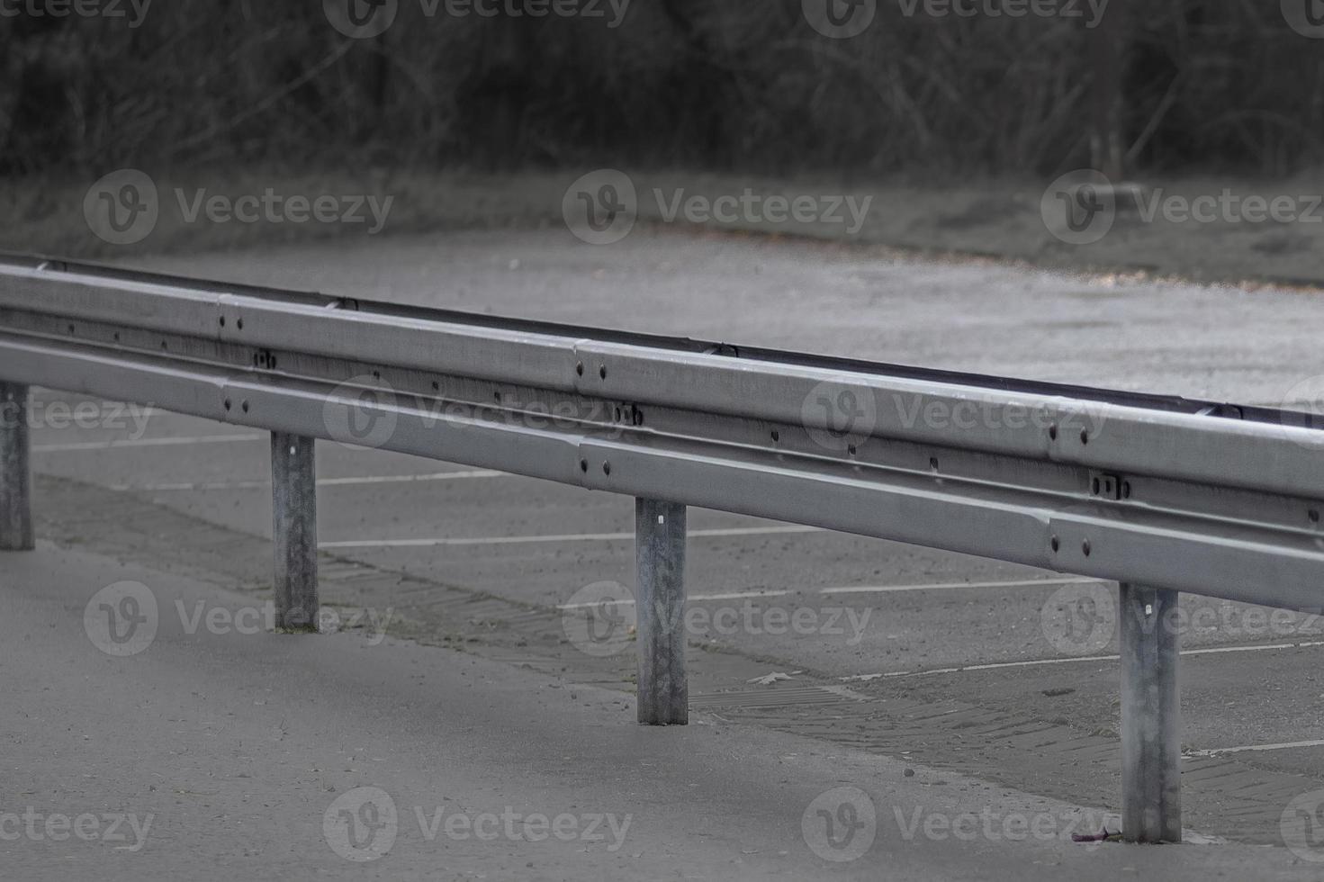 crash barrier on an old road photo