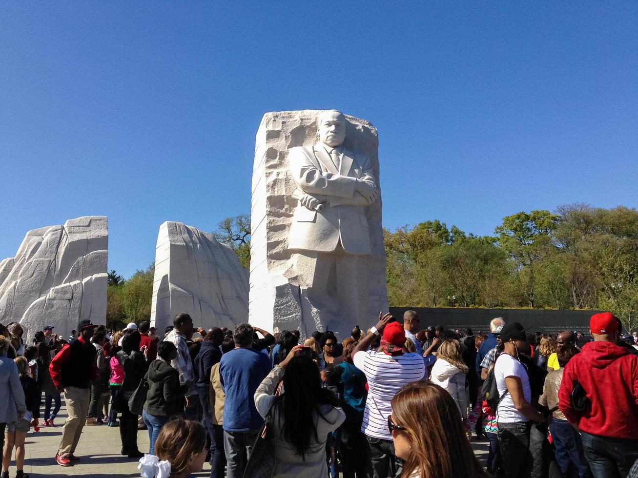 Washington, DC - April 7, 2012 -  Tourists around the Martin Luther King Junior Memorial in Washington, DC photo