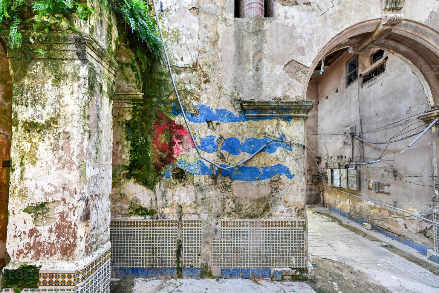 Old building in the process of collapsing in the Old Havana neighborhood of Havana, Cuba. photo