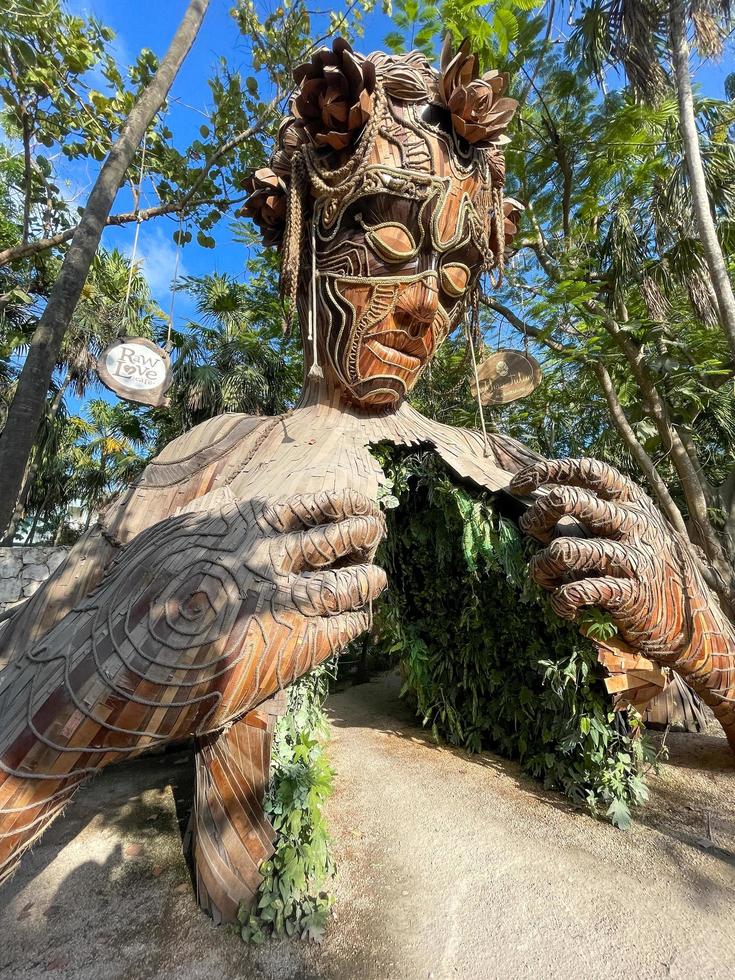 Tulum, Mexico - May 27, 2021 -  Human shaped gateway at the entrance to the hotel Ahau Tulum. photo