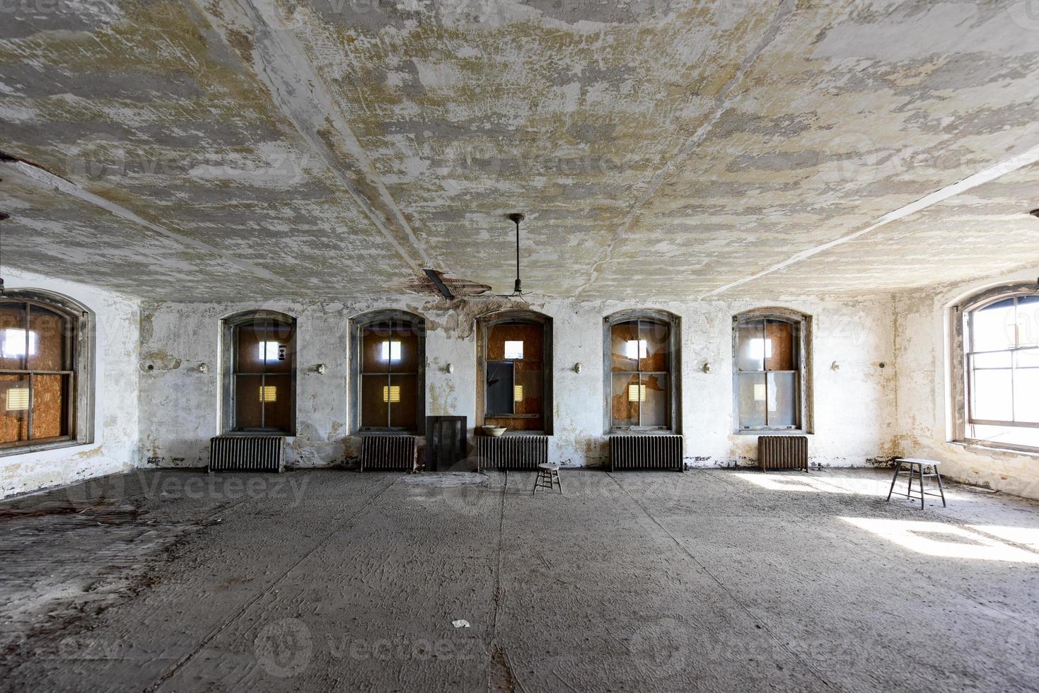 The abandoned Ellis Island Immigrant Hospital. It was the United States first public health hospital, opened in 1902 and operating as a hospital until 1930. photo