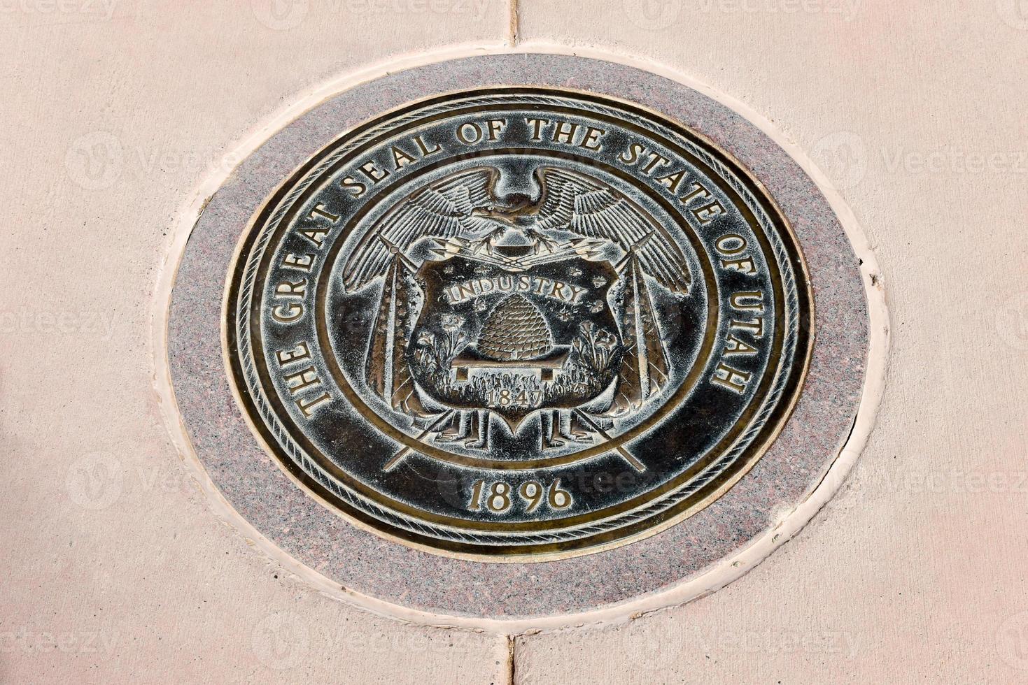 Utah state seal at the Four Corners Monument. photo