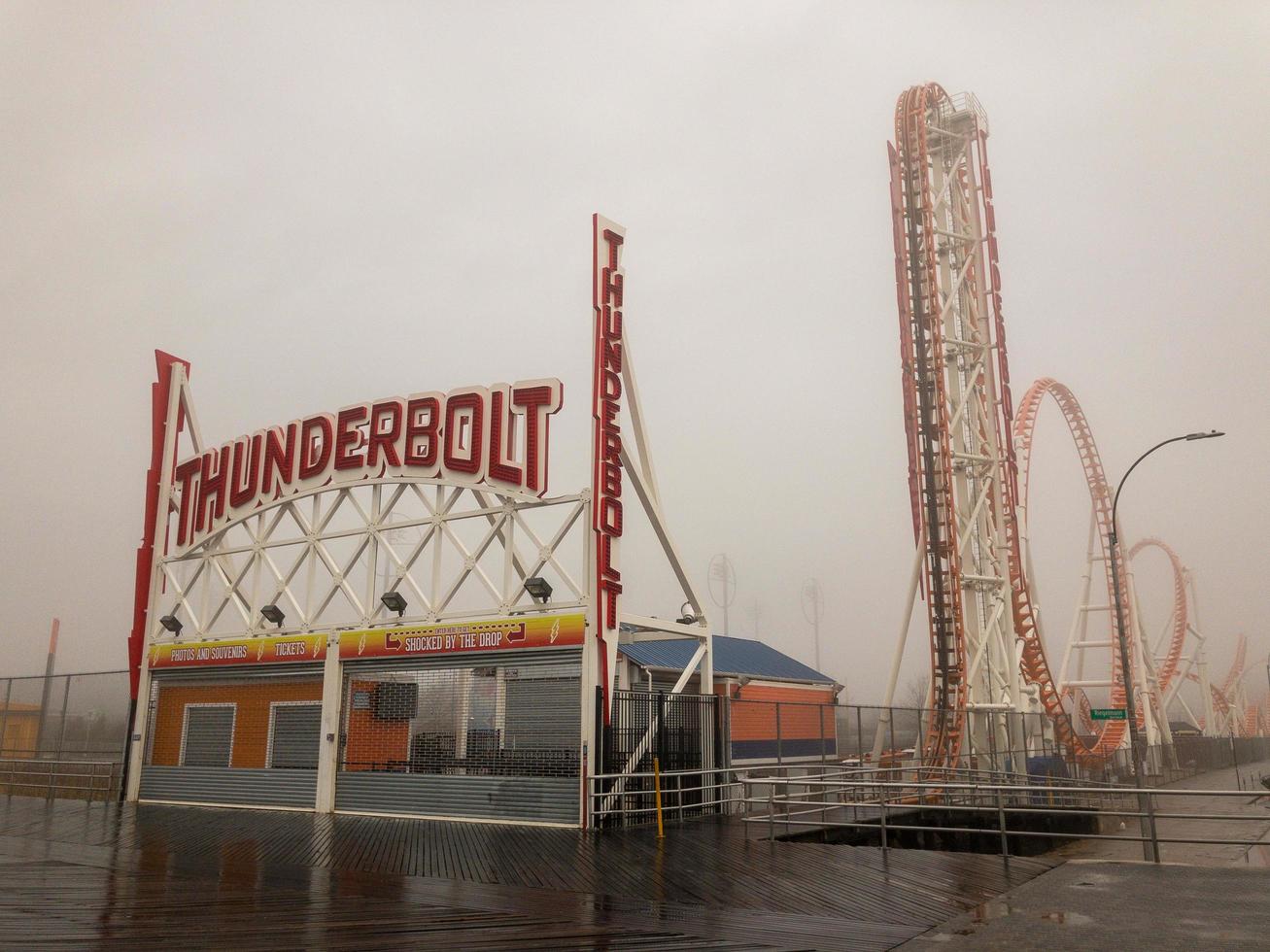 Brooklyn, New York - February 11, 2018 -  Thunderbolt Rollercoaster in Coney Island, Brooklyn on a foggy day. photo