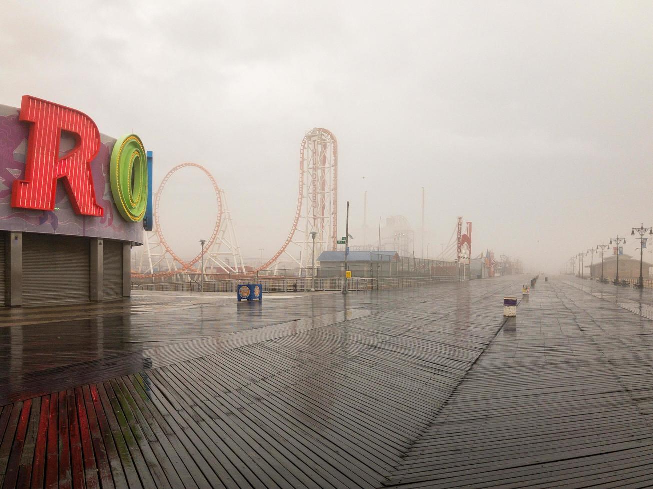 Brooklyn, New York - February 11, 2018 -  Thunderbolt Rollercoaster in Coney Island, Brooklyn on a foggy day. photo