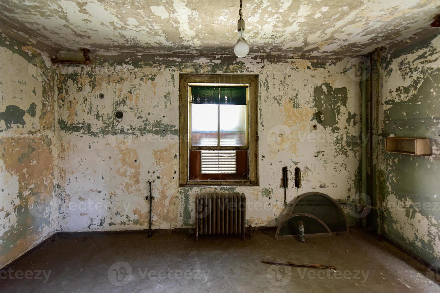 The abandoned Ellis Island Immigrant Hospital. It was the United States first public health hospital, opened in 1902 and operating as a hospital until 1930. photo