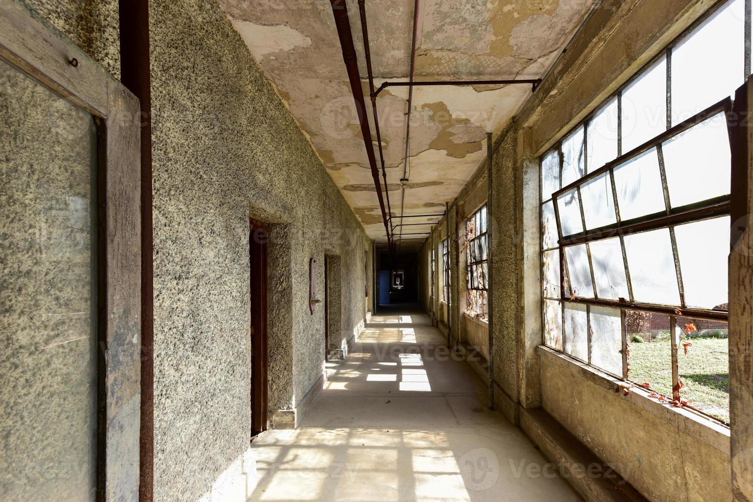 The abandoned Ellis Island Immigrant Hospital. It was the United States first public health hospital, opened in 1902 and operating as a hospital until 1930. photo
