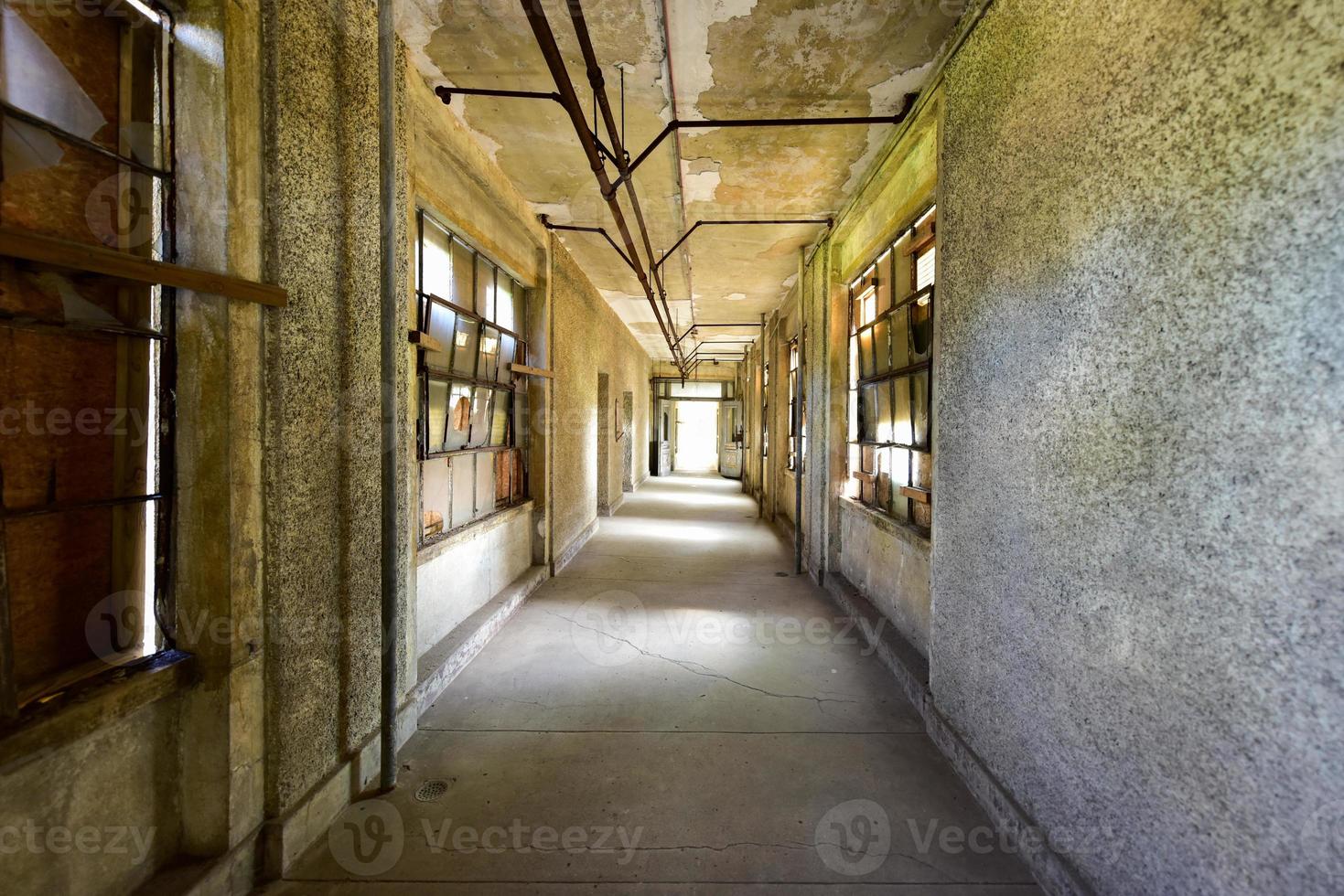 The abandoned Ellis Island Immigrant Hospital. It was the United States first public health hospital, opened in 1902 and operating as a hospital until 1930. photo