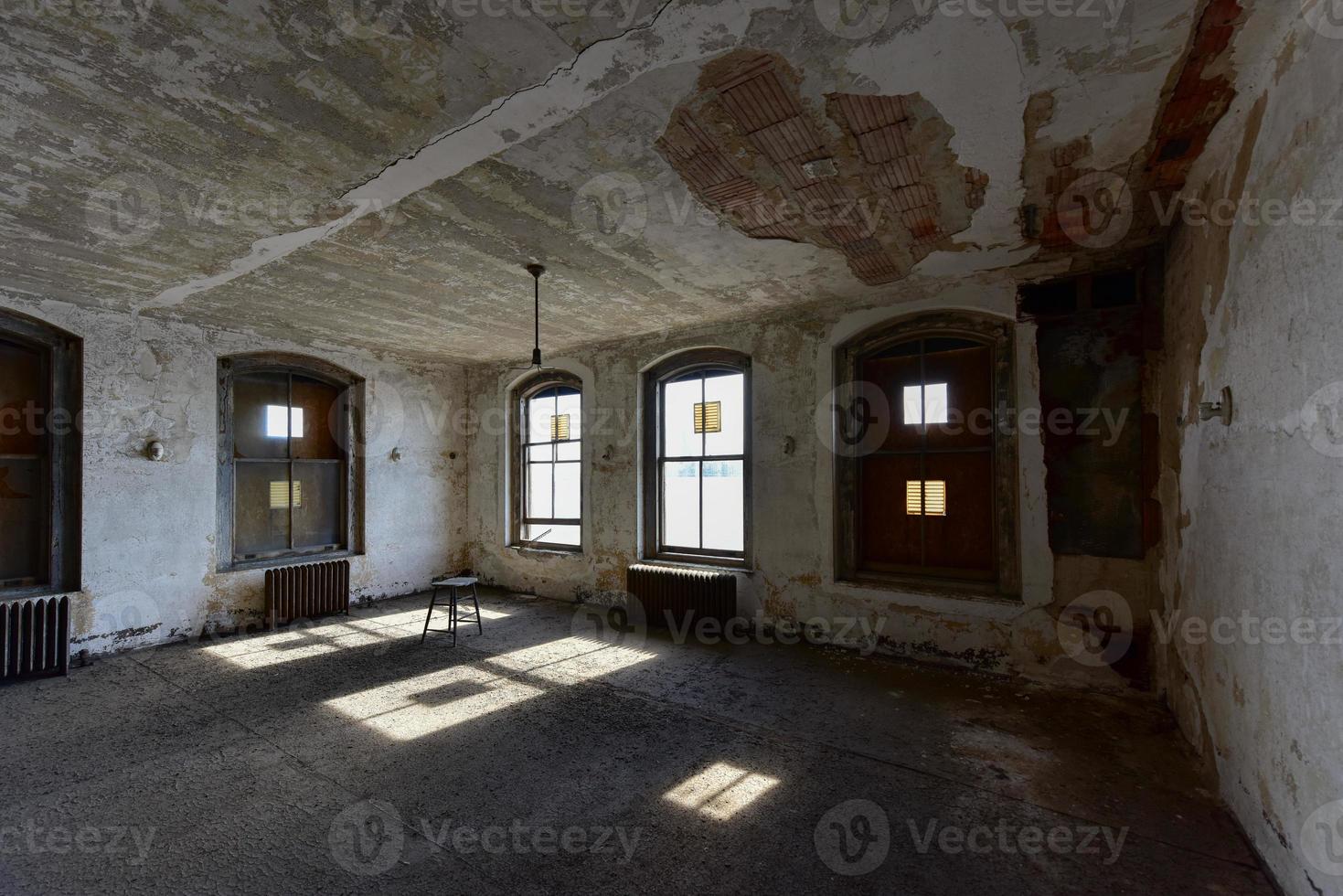 The abandoned Ellis Island Immigrant Hospital. It was the United States first public health hospital, opened in 1902 and operating as a hospital until 1930. photo