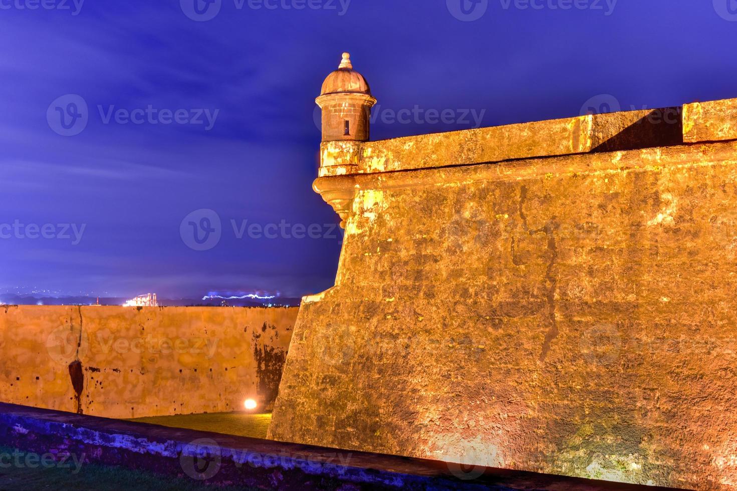 Castillo San Felipe del Morro also known as Fort San Felipe del Morro or Morro Castle at dusk. It is a 16th-century citadel located in San Juan, Puerto Rico. photo