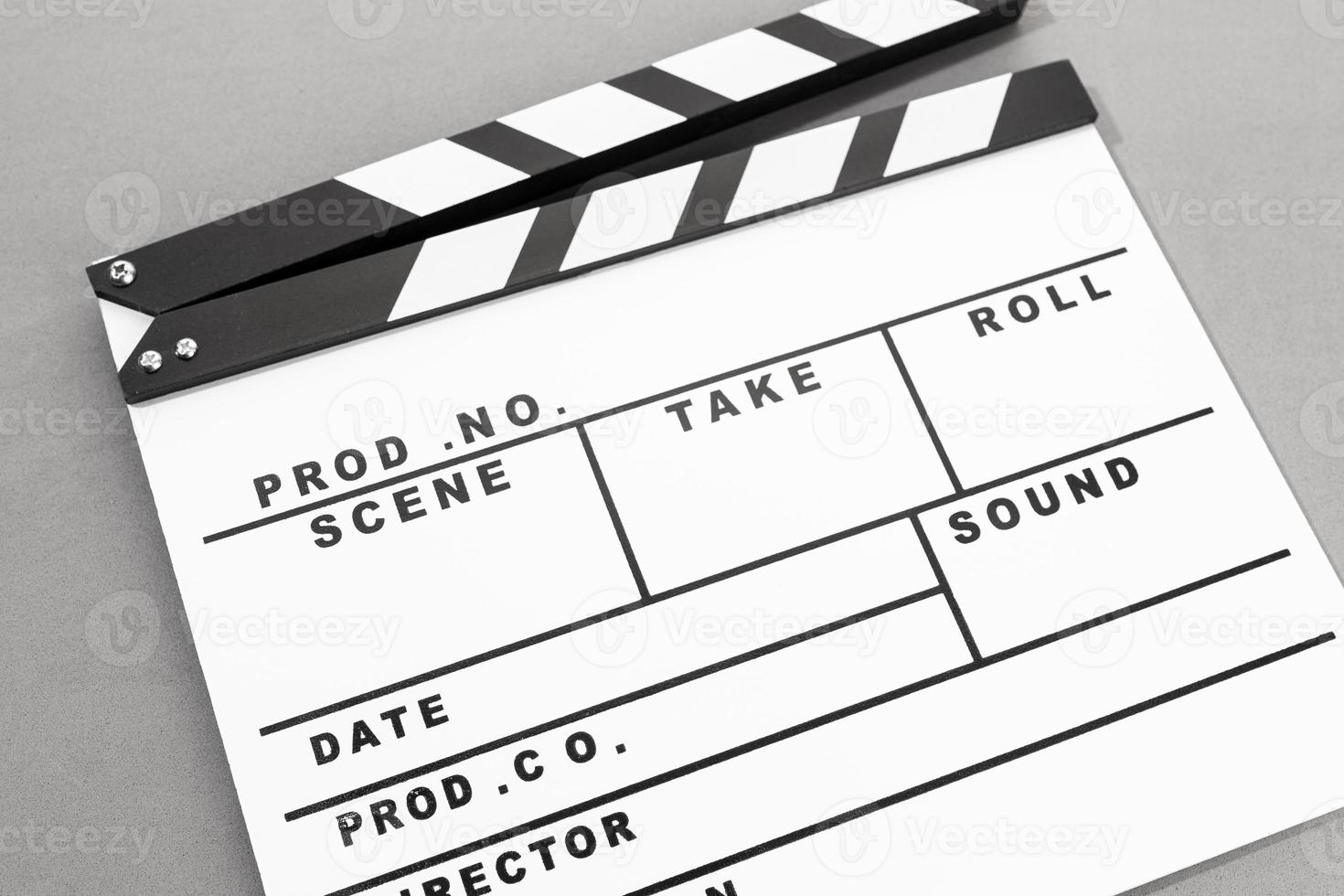 White Movie clapper board on gray background. Template photo