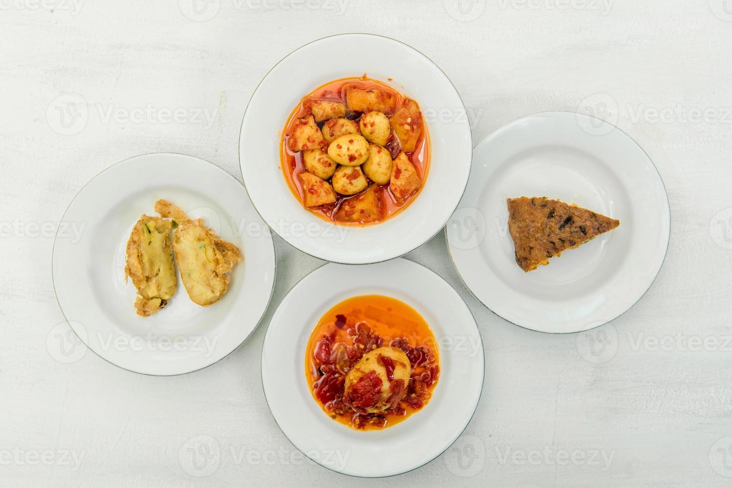 top view of scrambled eggs, eggs balado, eggs with  red chili and curry on dish. Indonesia food photo