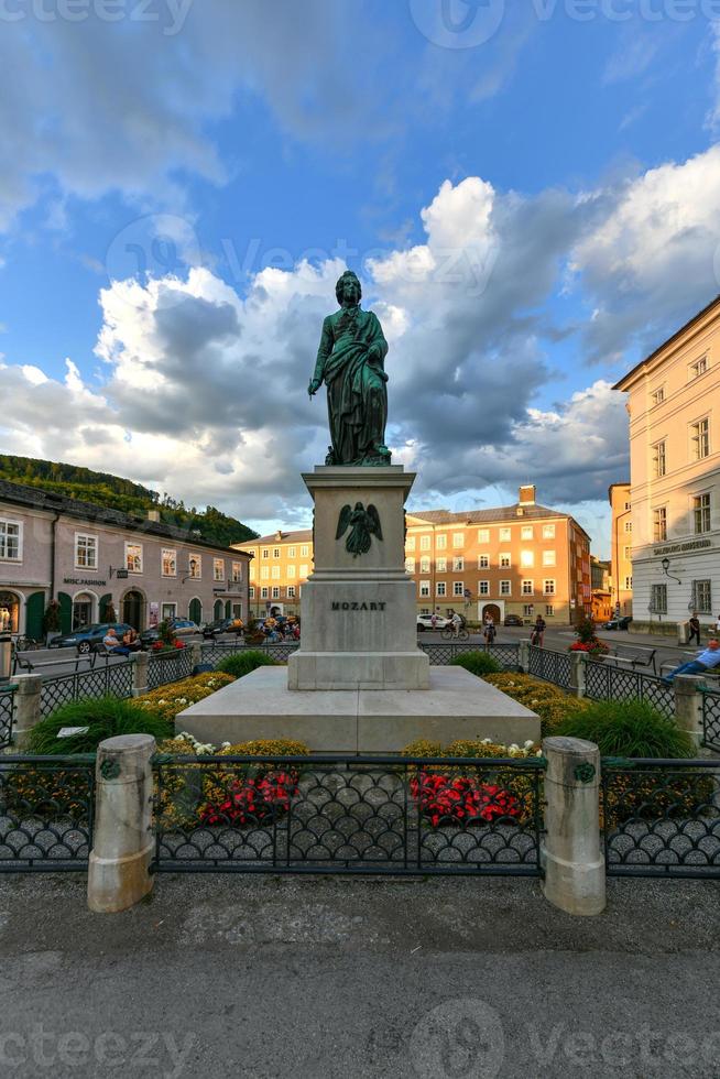 Salzburg, Austria, July 10, 2021 - In the centre of the Mozartplatz is the Mozart statue by Ludwig Schwanthaler. photo