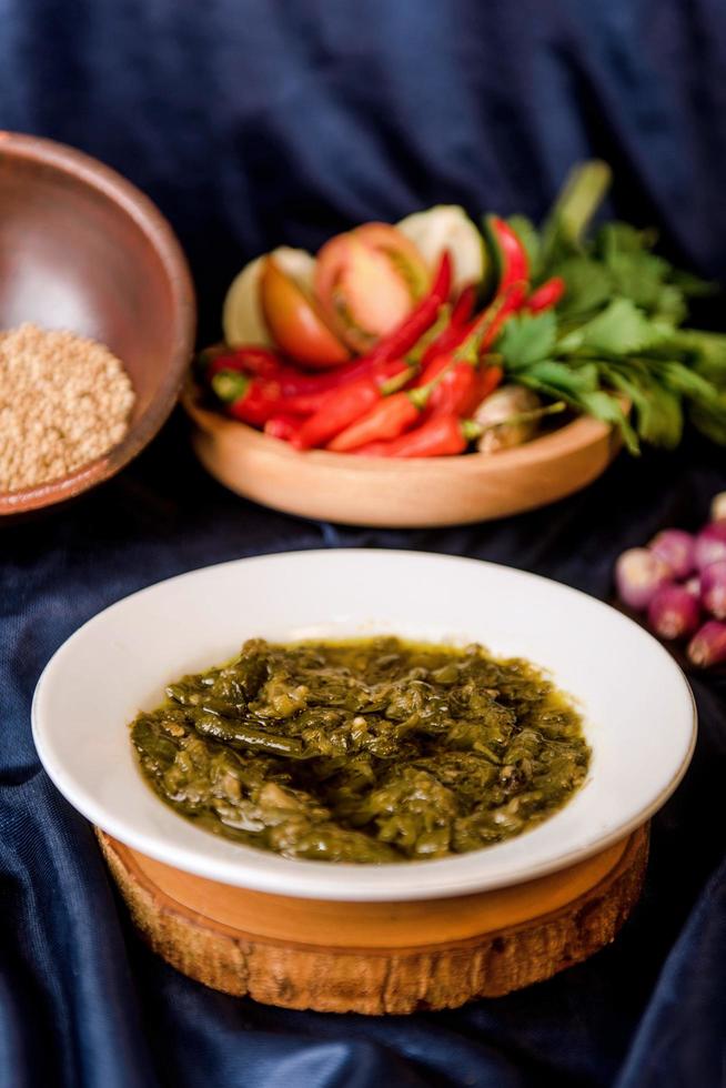 Indonesian green chili sauce called sambal ijo photo