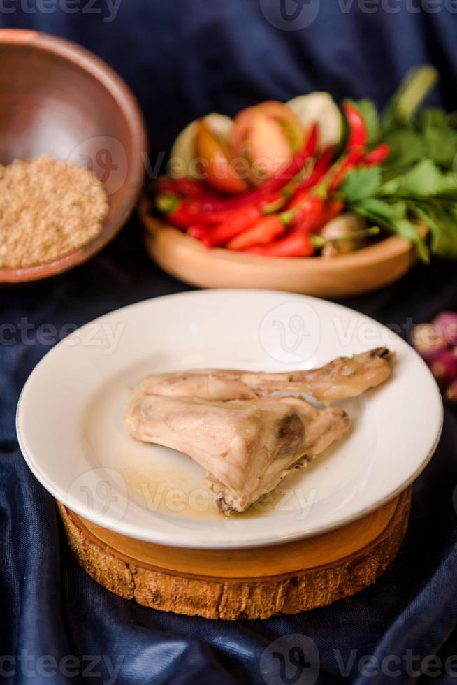 boiled chicken on dish photo