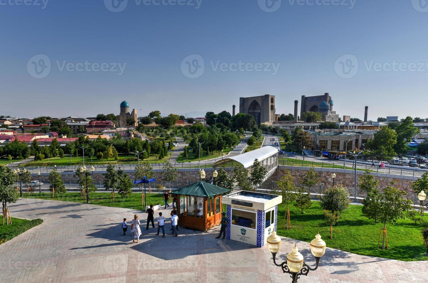 Samarkand, Uzbekistan - July 10, 2019 -  Bibi Khanym Mosque in Samarkand, Uzbekistan. In the 15th century it was one of the largest and most magnificent mosques in the Islamic world. photo