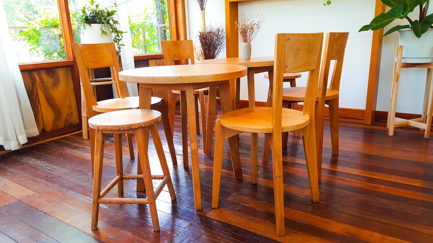 Brown wooden table set on wooden floor photo