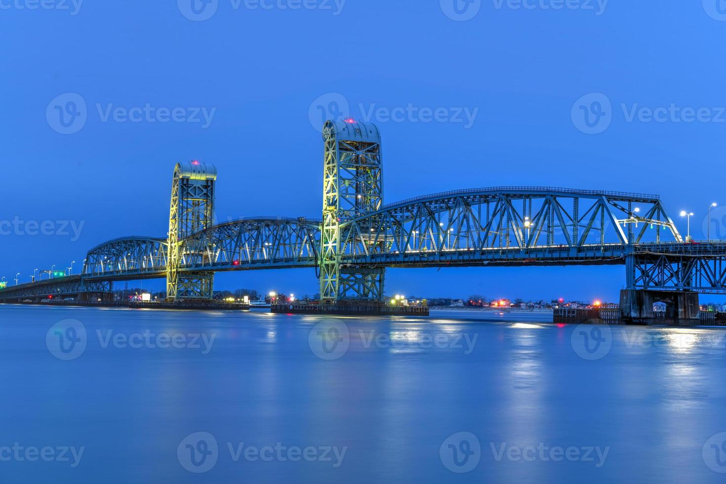 Marine Parkway-Gil Hodges Memorial Bridge as seen from Rockaway, Queens at dusk. Built and opened in 1937, it was the longest vertical-lift span in the world for automobiles. photo