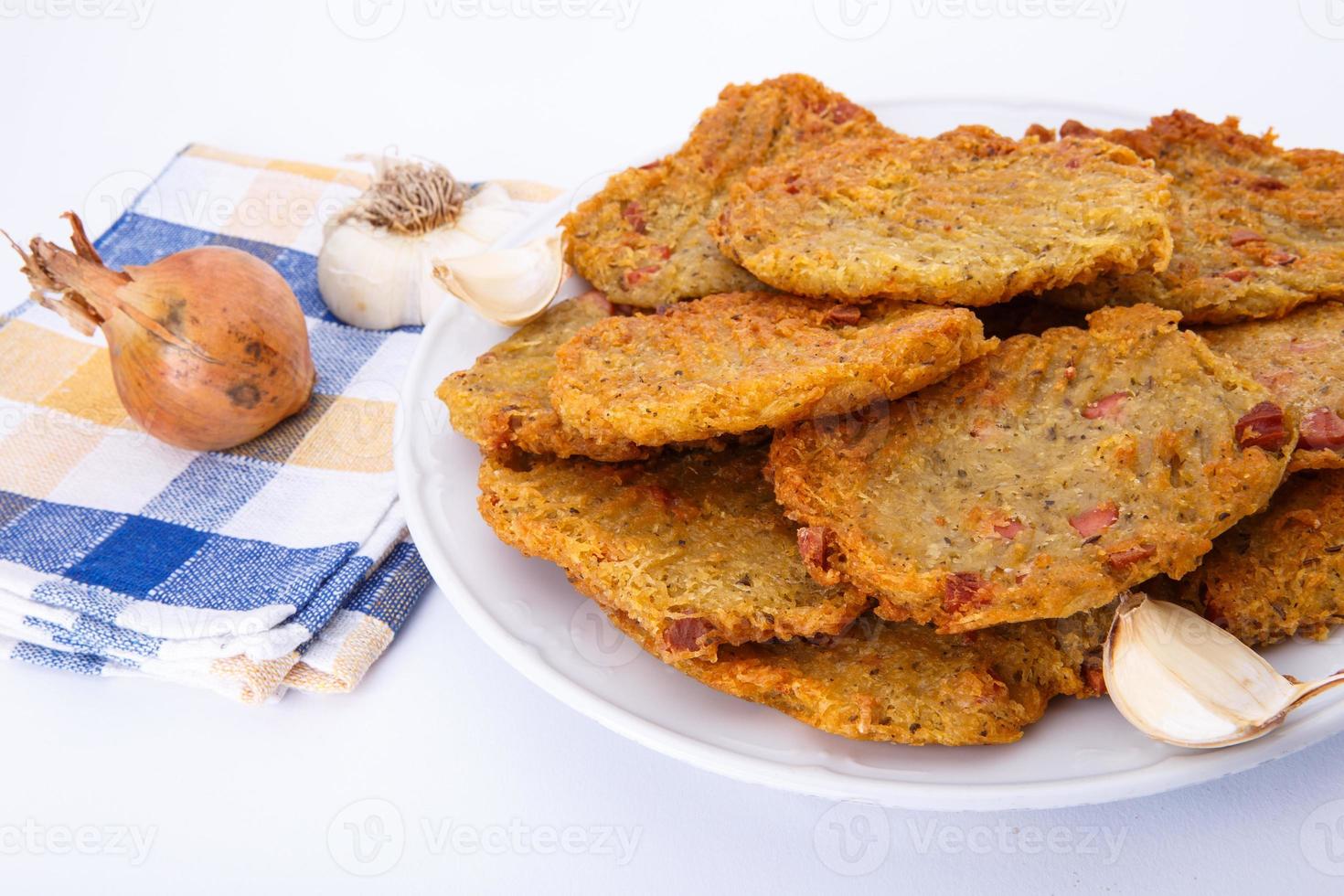 Fried potato pancakes on white plate photo