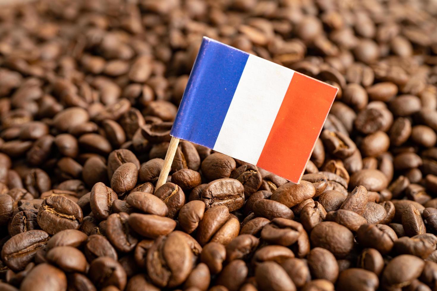 France flag on coffee bean, import export trade online commerce concept. flag on coffee bean, import export trade online commerce concept. photo