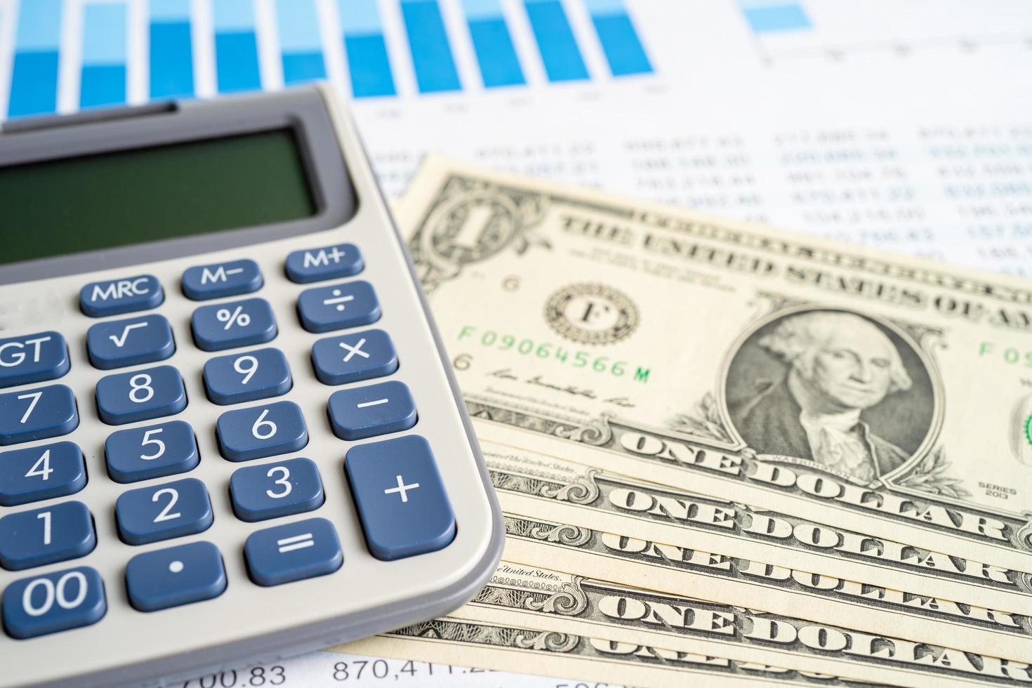 Calculator on graph paper. Finance development, Banking Account, Statistics, Investment Analytic research data economy, Stock exchange trading, Business company concept. photo