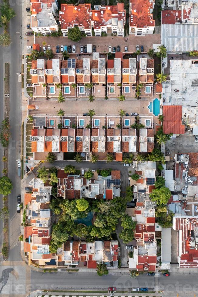 Aerial top down view of houses and housing complexes in Cancun, Mexico. photo