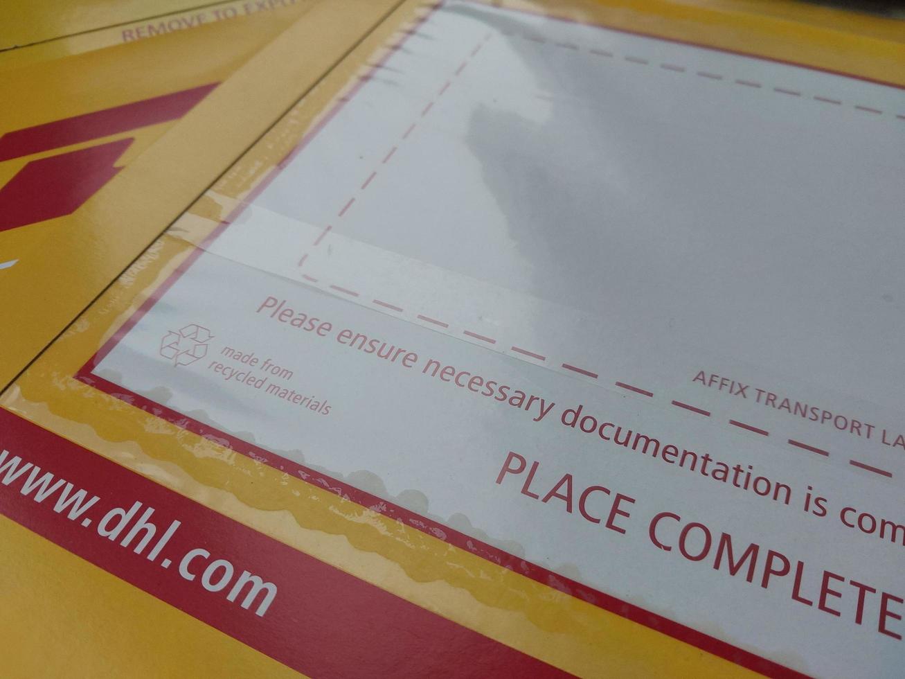 KIEV, UKRAINE - DECEMBER 10, 2022 Mail envelope service DHL photo