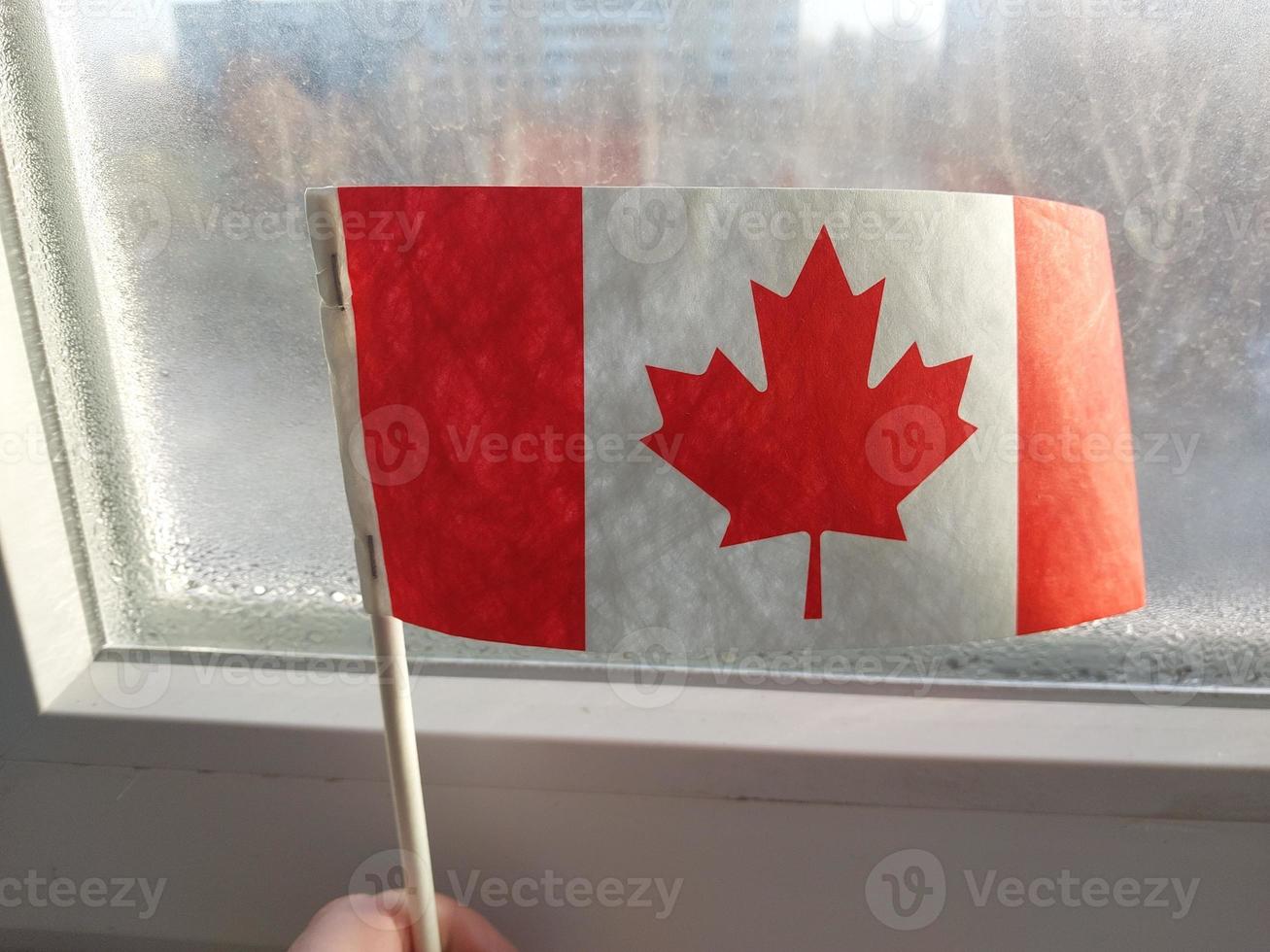 Canada country flag in winter season photo