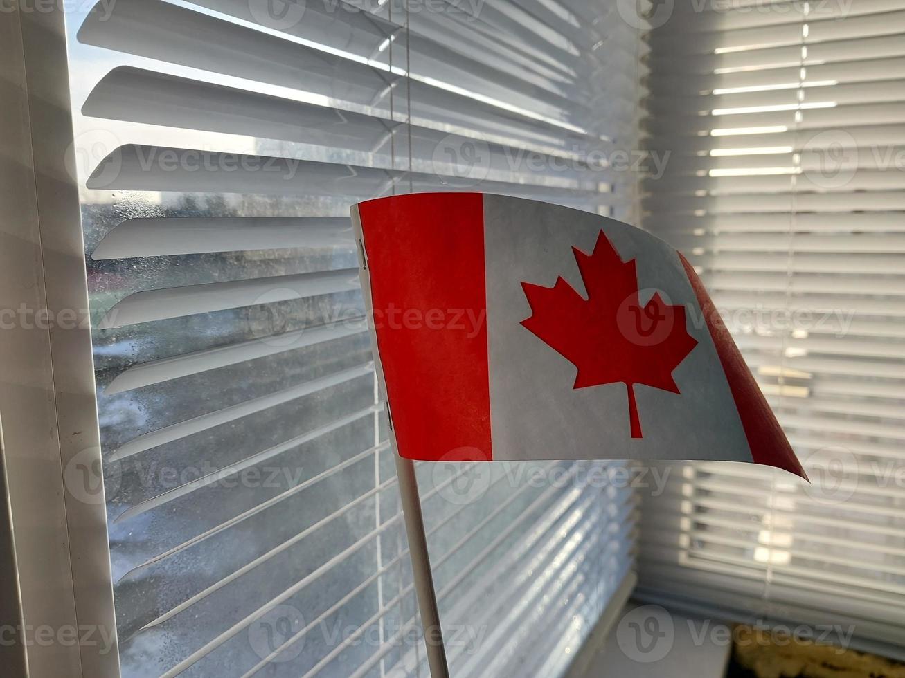 Canada country flag in winter season photo