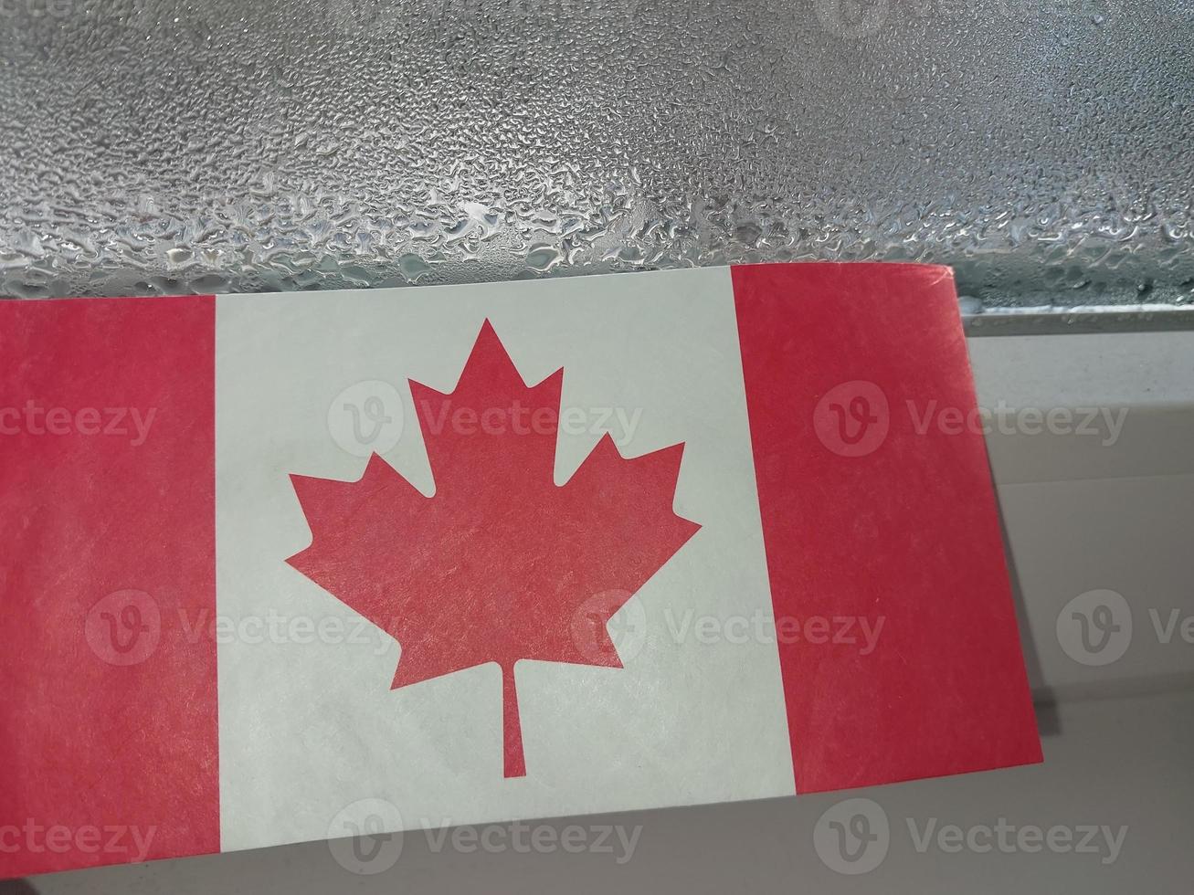 Canada country flag in winter season photo