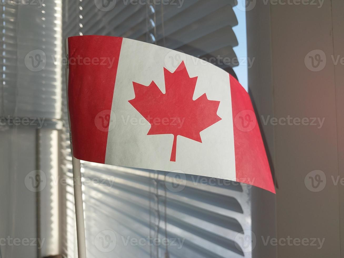 Canada country flag in winter season photo