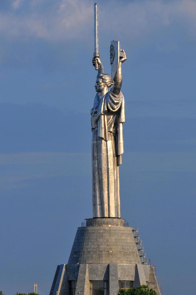 Motherland monument in Kiev, Ukraine. The stainless steel statue stands
