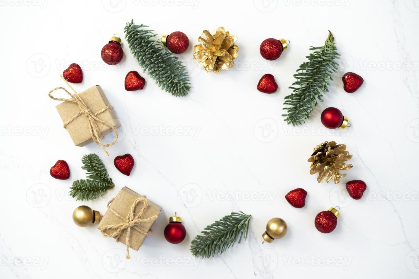 Mockup for a letter or a Christmas invitation with gold fir cone photo