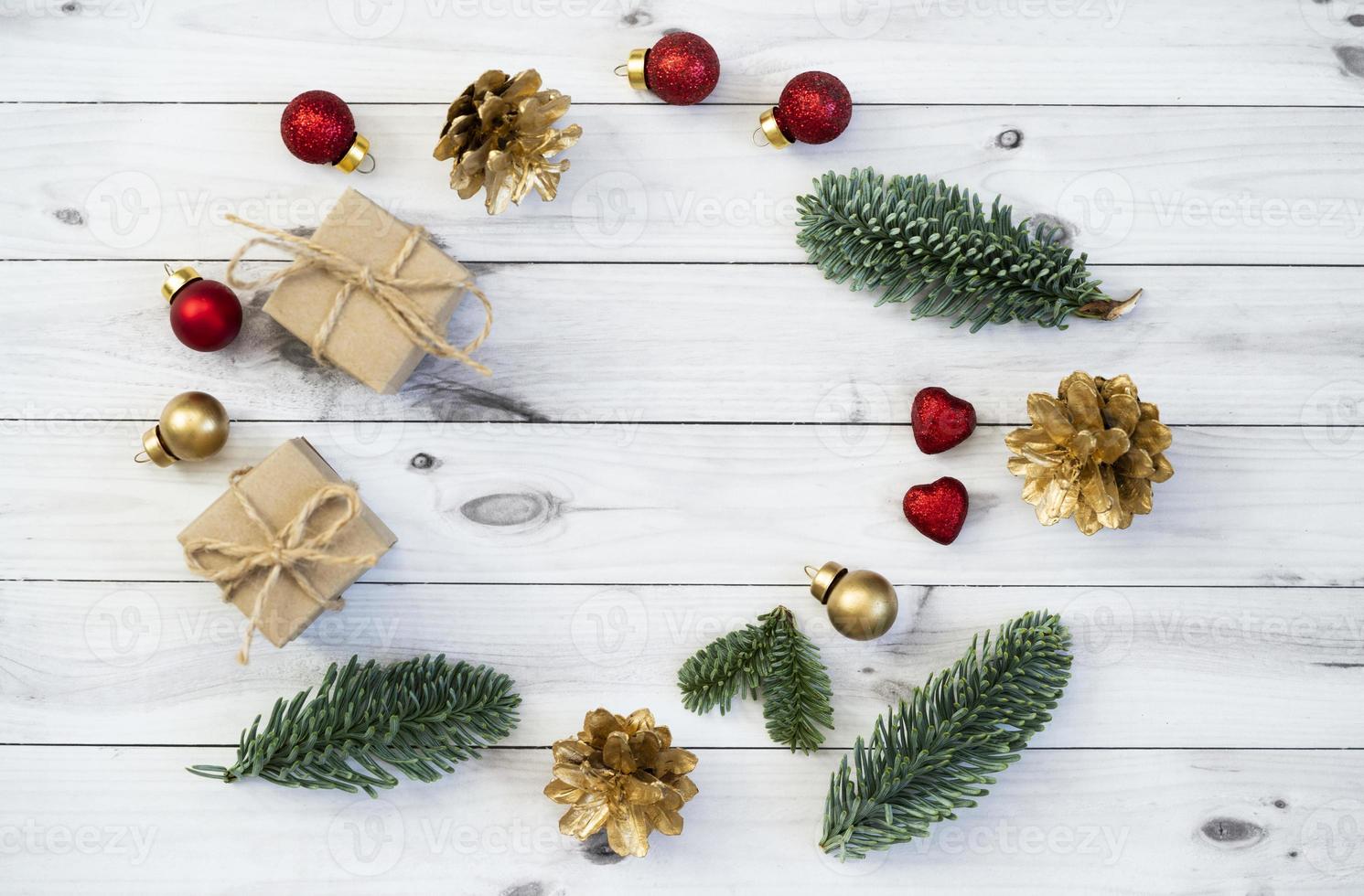 Mockup for a letter or a Christmas invitation with gold fir cone photo