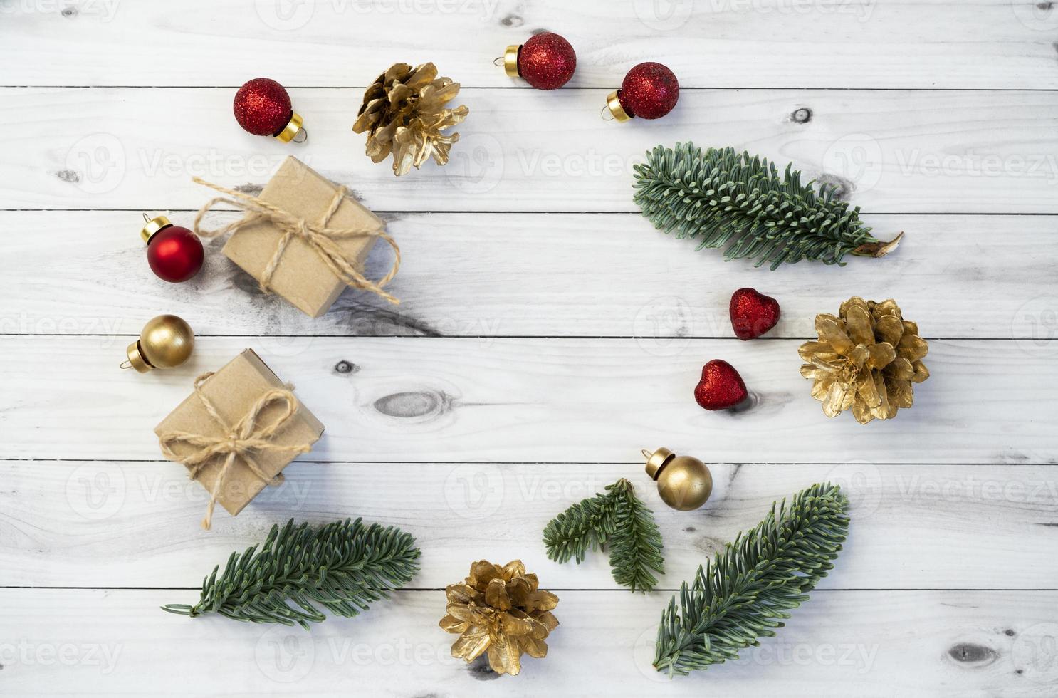 Mockup for a letter or a Christmas invitation with gold fir cone photo