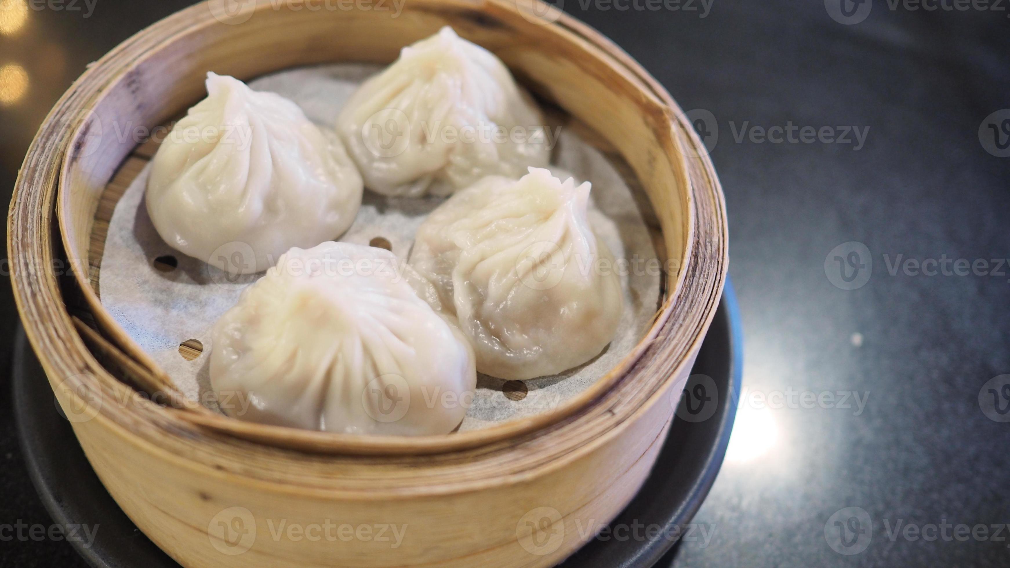 Xiao long bao or steamed pork and soup bun or dim sum.It is steamed