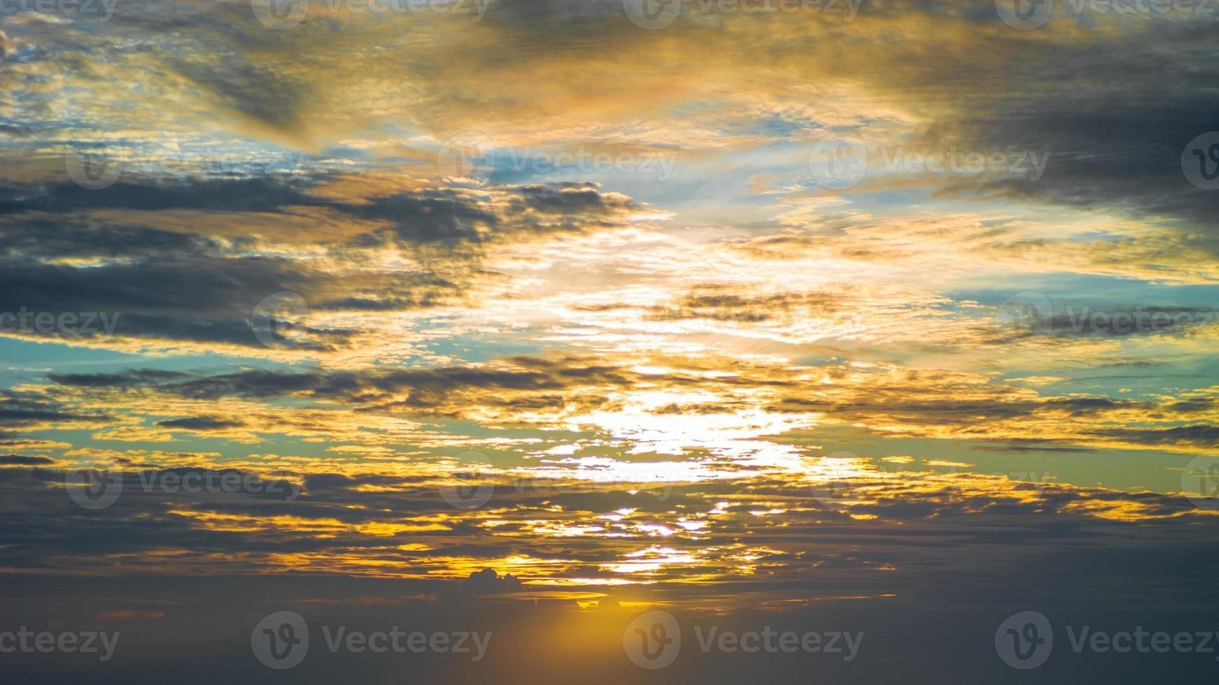 Sunset clouds nature background. Golden hour. Beautiful cloudscape photo