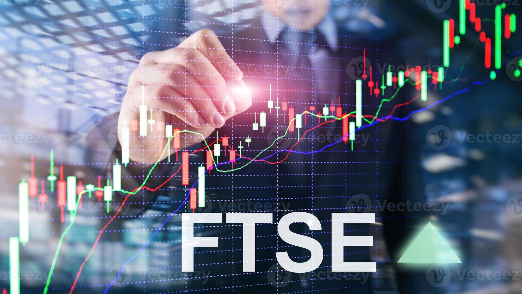 FTSE 100 Financial Times Stock Exchange Index United Kingdom UK England Investment Trading concept with chart and graphs. photo