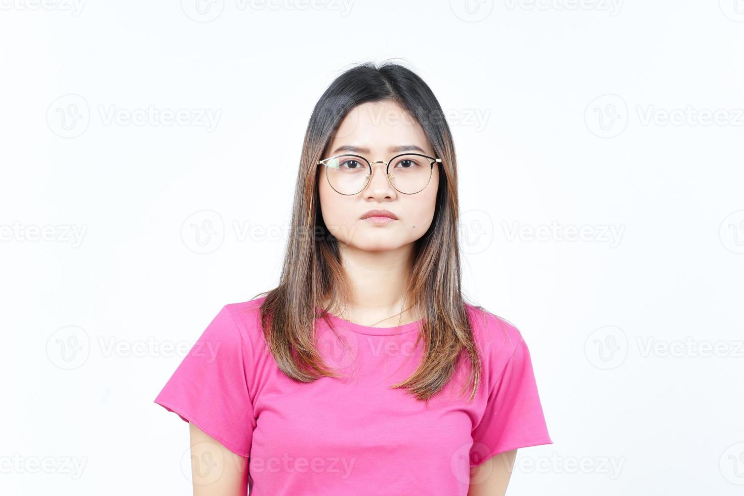 Looking at camera with serious face expression Of Beautiful Asian Woman Isolated On White Background photo