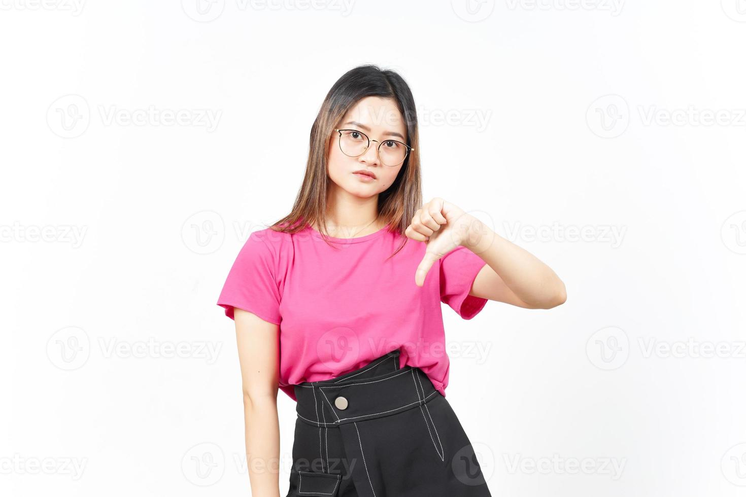Showing Thumbs Down Of Beautiful Asian Woman Isolated On White Background photo