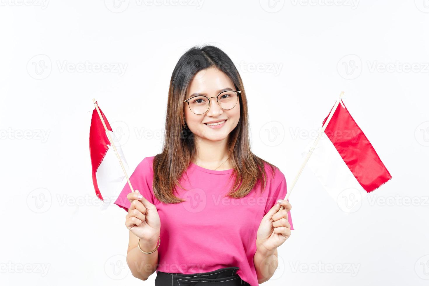 Holding indonesia flag Of Beautiful Asian Woman Isolated On White Background photo