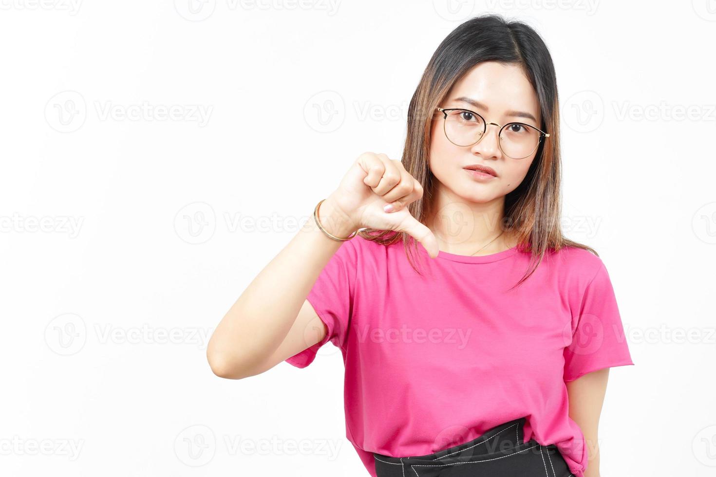 Showing Thumbs Down Of Beautiful Asian Woman Isolated On White Background photo